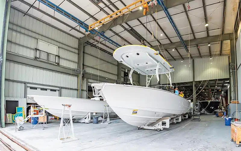 A Valhalla Boatworks V-55 center console being built inside the production facility, ready for assembly and outfitting