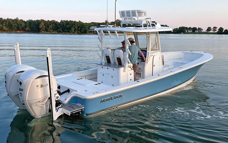 A rear angle of the Regulator 30XO powered by twin Yamaha V6 outboards, showcasing its spacious deck and fishing setup