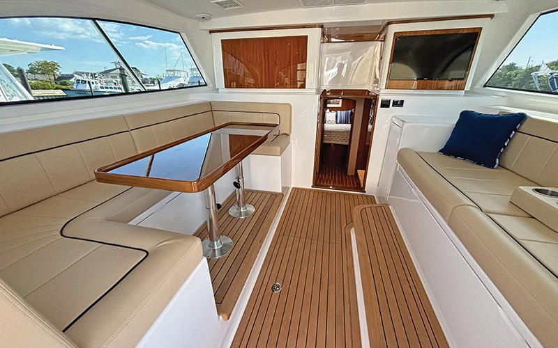 Interior of the Viking 46 Billfish, highlighting the comfortable seating and dining area with high-quality finishes and ample natural light